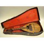 A nineteenth century Italian mandolin, trade label for Pietro Tonelli, Naples. 23in (58cm). Cased.
