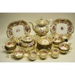 A William IV porcelain part tea service, painted flowers and grey ground panels with gilding,