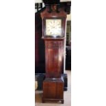 An early nineteenth century oak longcase clock, the eight day movement striking on a bell, the