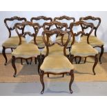 A set of eight early Victorian rosewood side chairs, the scroll moulded open backs to stuffed over
