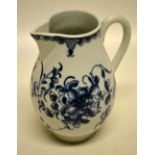 A First period Worcester blue and white porcelain sparrow beak jug, decorated flowers. 4.25in (10.