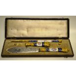A nineteenth century French writing set, gilt metal and floral blue banded enamel handles, the paper