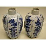 Two Chinese porcelain blue and white octagonal vases, one with panels of prunus and flowering