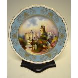 A modern Aynsley bone china cabinet plate, decorated a view of Warwick Castle, hand painted by J.