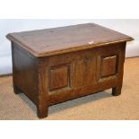 A late seventeenth century oak coffer bach, the cleated edge hinged lid (with one side cleat