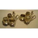 A pair of Victorian silver trefoil condiment cruets, engraved with the Lutwych crest, the frames
