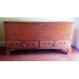A late eighteenth century pine mule chest, the hinged lidded compartment top above two frieze