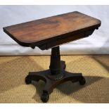 A William IV rosewood veneered swivel top card table, baize lined with a well, the frieze with