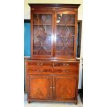 A nineteenth century mahogany library bookcase, inlaid chequer stringing, the top with a