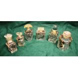 Six French glass scent bottles, with art Nouveau design plated and silver coloured metal pierced