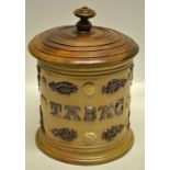A Victorian Lambeth stoneware tobacco jar, with raised patterned decoration and TABAC, having a