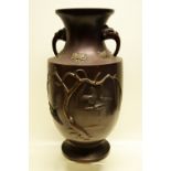 A late nineteenth century Japanese bronze vase, with raised decoration of kingfishers flying