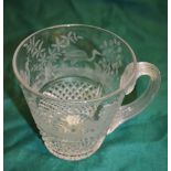 A Victorian large glass mug, engraved herons on a river bank, above hobnail cutting, a reeded scroll