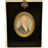 An early Victorian oval miniature portrait on ivory, of Charles Long, in an ebonized easel back