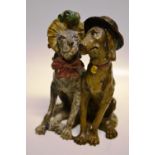 A cold painted romantic bronze group of dressed dogs. 6.75in (17cm).