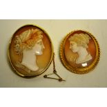 A brooch, oval shell cameo of young female with butterfly, framed in yellow gold Etruscan style