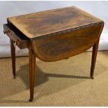 A Regency rosewood veneered Pembroke table, the rectangular top with a shallow bow front and 'D'