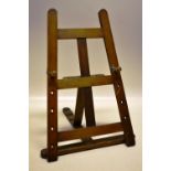 A late nineteenth century pine table easel. 18in (46cm) high.