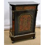 A nineteenth century French Pier cabinet, ebonized wood with brass stringing and chased ormolu