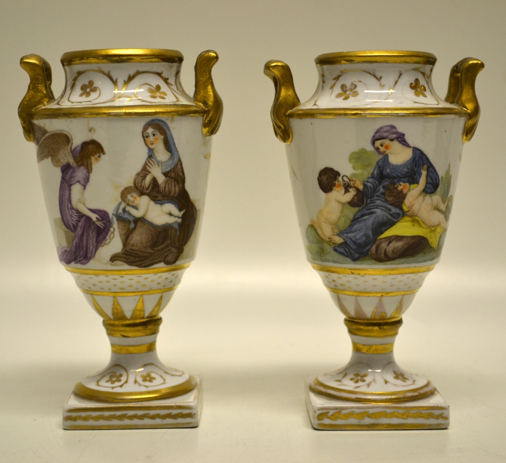 A pair of Regency porcelain vases, with coloured allegorical female figures of the Virgin child