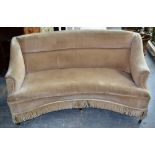 A late nineteenth century upholstered curved back settee, covered a pale grey dralon, the sprung