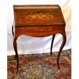 A French late nineteenth century rosewood veneered bureau de dame, inlaid stringing, the tor with