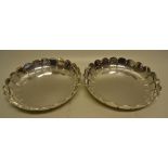 A pair of early Victorian silver strawberry dishes, the raised ribbed panelled sides engraved a