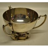 An Edwardian silver tyg shape bowl with three bracket handles, on a spreading foot. Maker Ernest