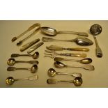 Silver fiddle pattern cutlery comprising; a pair of Victorian table spoons, (tips of bowls worn) a