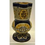 A Victorian Doulton Lambeth stoneware Gothic Revival baluster vase, Royal blue border to the incised
