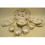 A quantity of early nineteenth century Paris porcelain, some marked Nast a Paris, decorated sprigs