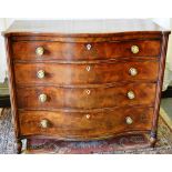 A Regency mahogany serpentine chest, with a cross banded figured veneered frieze and four long