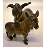 A miniature bronze donkey and foal. 3in (7.5cm). Late nineteenth century.