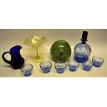 An Art Deco blue tinted engraved glass liquere set, the decanter with a black glass stopper and