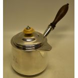 A large early Victorian silver lidded brandy saucepan, having a hinged cover to the spout, a