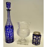 A nineteenth century blue overlaid panel cut glass hexagonal jar, with repousse foliage plated