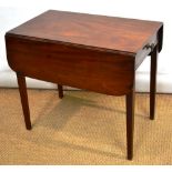 A Regency mahogany Pembroke table, the rectangular drop leaf top with rounded corners, a drawer