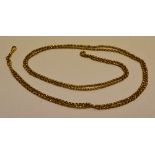 A Victorian gold muff chain, bachelor style facetted, stamped JM9C, approx 23gm. 4ft 10in (148cm) (