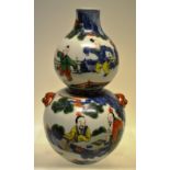 A Chinese underglaze blue and white porcelain double gourd vase, Klobber decorated in famille