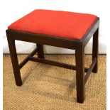 A mahogany stool, in George III style, the rectangular drop in seat on square chamfered legs with