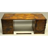 A Japanese parquetry miniature travelling desk, fitted banks of graduated draws with swing
