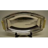 An art Deco electroplated Sheffield made ovoid bread dish, with engraved stepped bands and two ivory