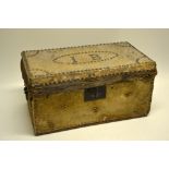 An early nineteenth century animal skin covered pine travelling trunk, with brass nail decoration