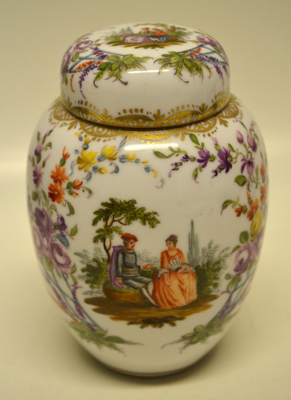 A German late nineteenth century, porcelain tea vase, decorated a courting couple seated in a