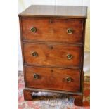 A small mahogany veneered secretaire, the fall front fitted drawer above 2 long drawers, with