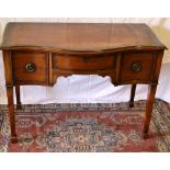 A mahogany dressing table, the serpentine front veneered in fiddle back mahogany, the three oak