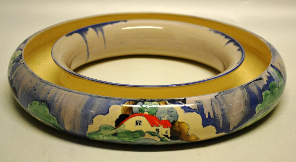 A large Clarice Cliff china crocus ring by Newport pottery, orange roof country cottage pattern.