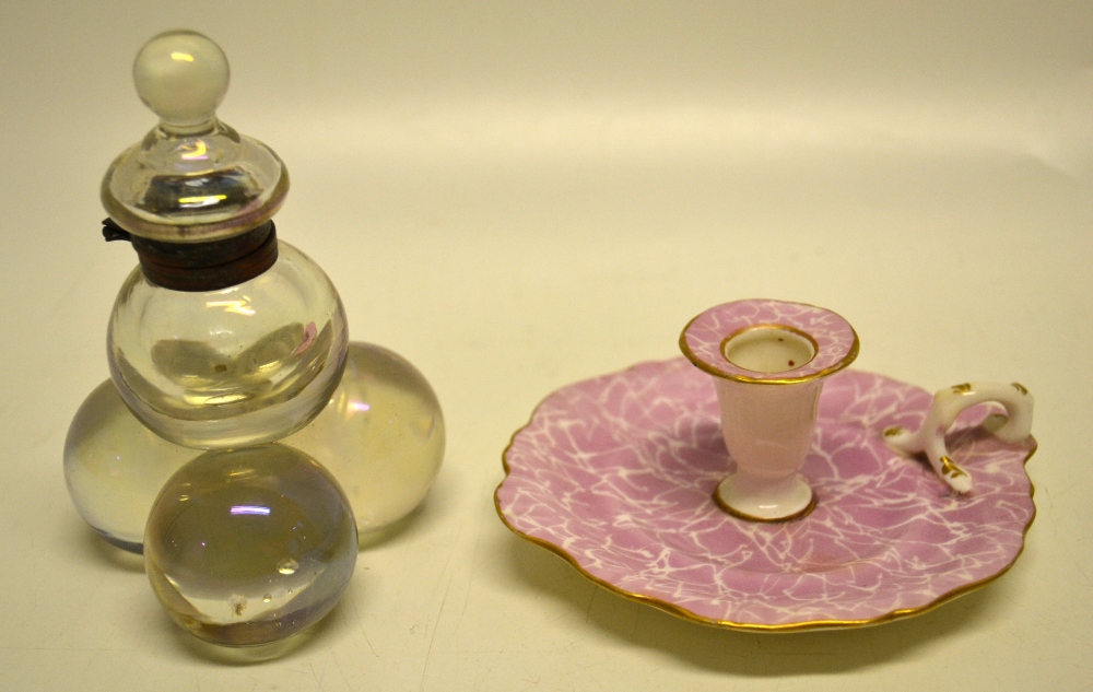 A Worcester pink porcelain chamberstick circa 1820 and an unusual glass a stack of balls inkwell