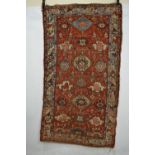 Two Kurdish rugs, north west Persia, about 1910-20s, one with pale blue inner guard, 7ft. 2in. x