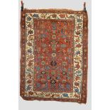 Kurdish rug, north west Persia, second half 19th century, 5ft. 1in. x 3ft. 10in. 1.55m. x 1.17m.